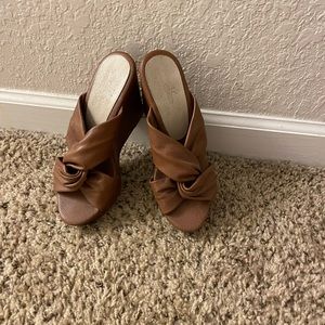 Karol Toro brown leather wedge espadrilles.